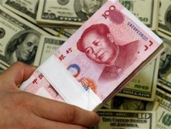 Центробанк Китая понизил курс юаня до минимума с января 2011 года